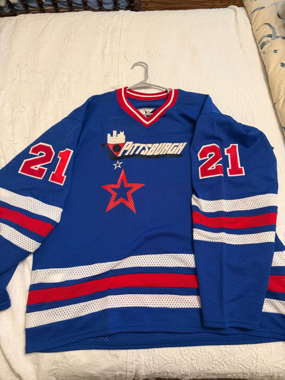 Cooper Red, White and Blue Mesh Hockey Jersey Collar Detail